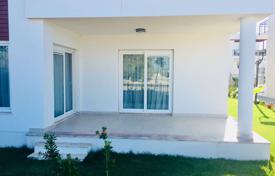 Комфортабельная квартира 2+1 с террасой и выходом в сад на берегу Средиземного моря в районе Бодрум за 233 000 €
