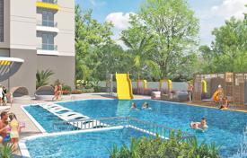 Новые квартиры с балконами в охраняемой резиденции с бассейнами, садом и аквапарком, в 120 метрах от пляжа, Махмутлар, Турция за $294 000