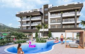 Новая резиденция с бассейном и круглосуточной охраной, Оба, Турция за От $149 000